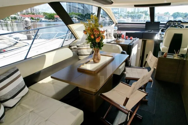 Slide: The Image of Luxurious interior of 2015 Azimut 55S yacht with elegant seating and dining area. - 33