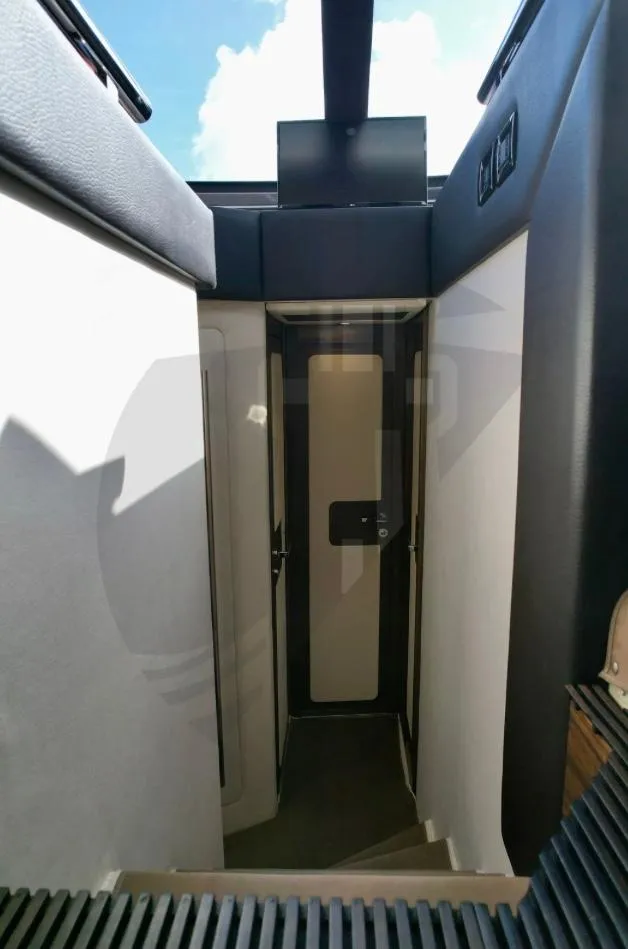 Slide: The Image of Interior stairway of 2015 Azimut 55S yacht, featuring sleek modern design. - 36