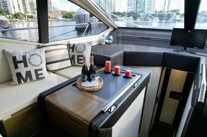 Slide: The Image of Luxurious 2015 Azimut 55S yacht interior with elegant seating and decor. - 39