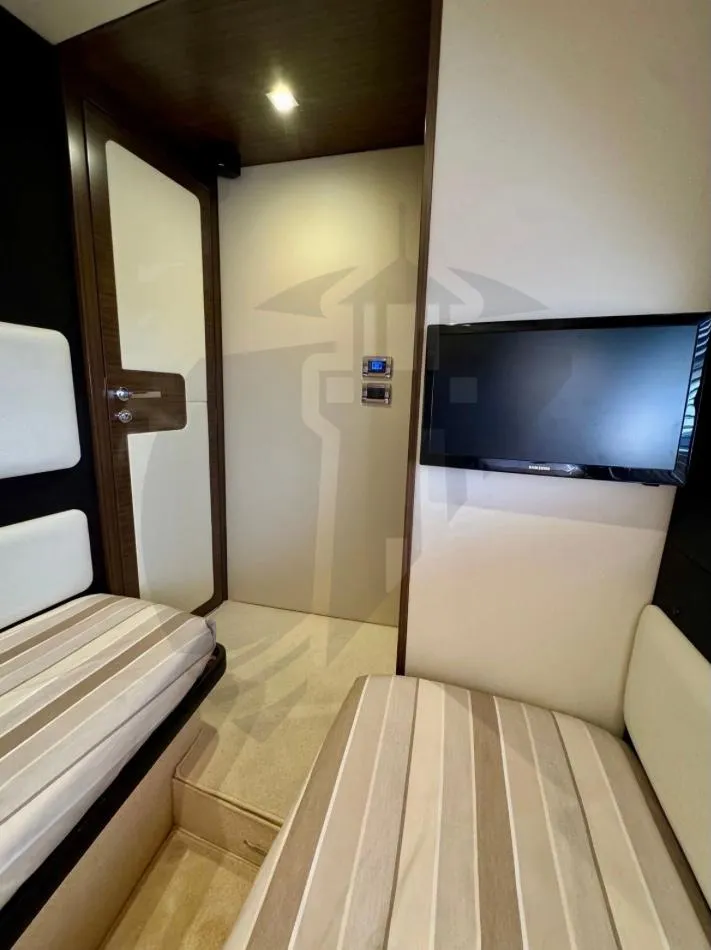 Slide: The Image of Interior of 2015 Azimut 55S yacht cabin with modern design and TV. - 40