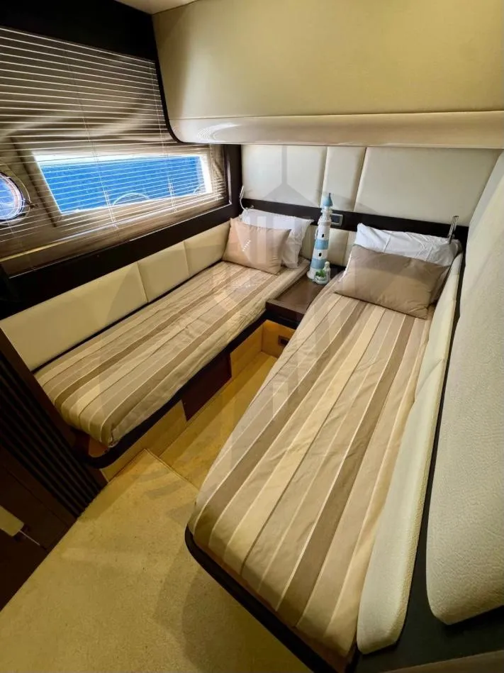 Slide: The Image of Luxurious twin cabin in 2015 Azimut 55S yacht with elegant decor. - 42