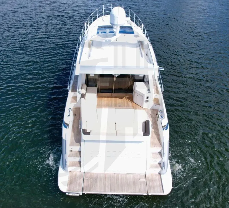 Slide: The Image of Aerial view of 2015 Azimut 55S yacht on open water. - 7