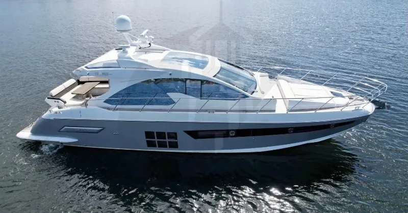 Slide: The Image of 2015 Azimut 55S luxury yacht cruising on calm waters. - 88