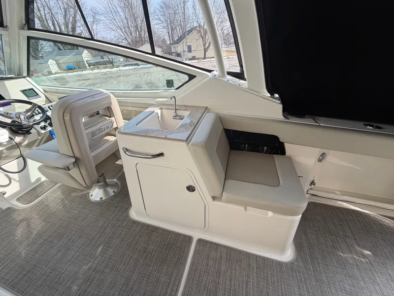 Slide: The Image of Interior of 2025 Boston Whaler 28 Vantage with seat and sink. - 11