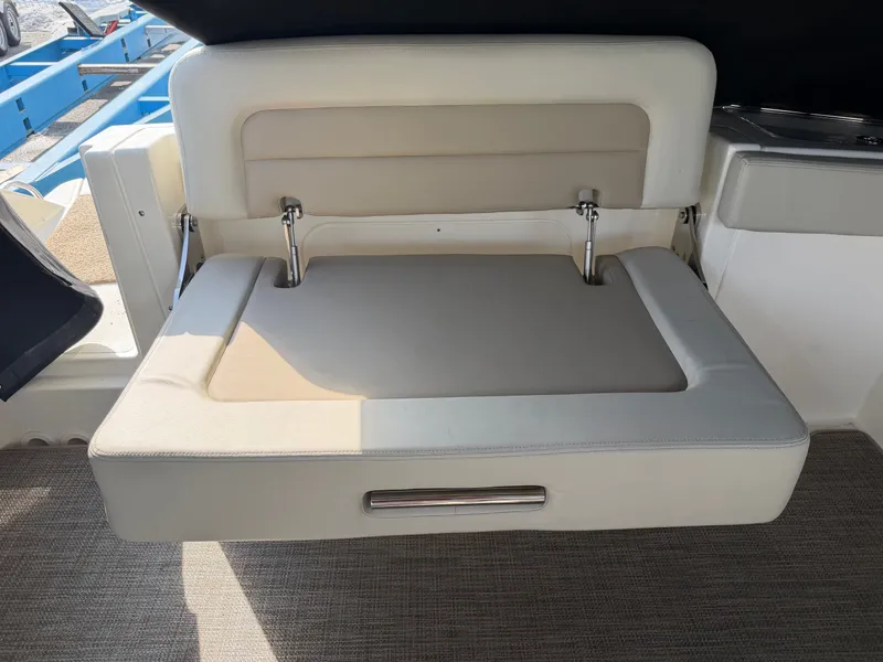 Slide: The Image of Boston Whaler 28 Vantage 2025, foldable seat on boat. - 14