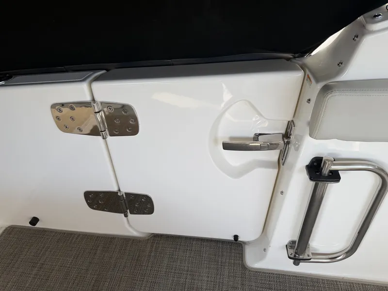Slide: The Image of Close-up of door latch on a 2025 Boston Whaler 28 Vantage boat. - 16