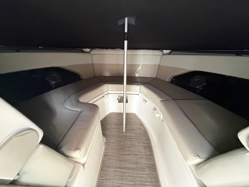 Slide: The Image of Interior of 2025 Boston Whaler 28 Vantage with cushioned seating. - 20