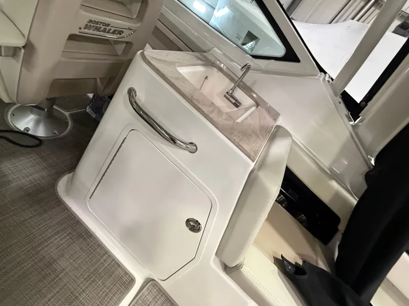 Slide: The Image of Interior of 2025 Boston Whaler 28 Vantage with sink. - 23