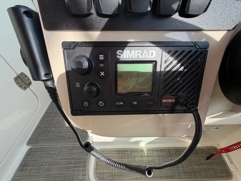 Slide: The Image of Simrad radio on Boston Whaler 28 Vantage 2025 boat. - 9