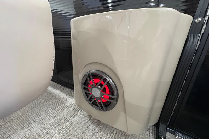 Slide: The Image of Speaker with red lighting in 2025 Crest Classic 220 boat interior. - 27