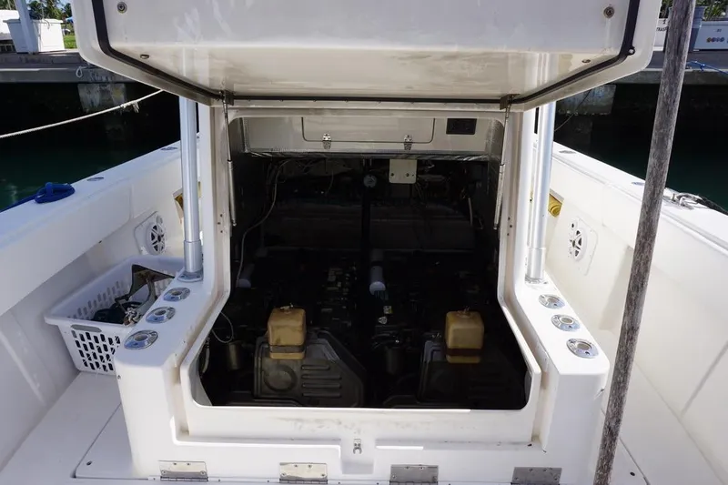 Slide: The Image of 2006 SeaVee 340i Open boat engine compartment with open hatch, dockside view. - 16