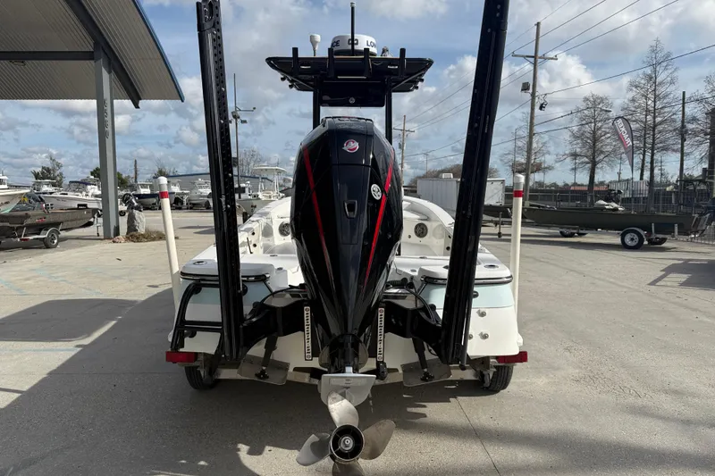 Slide: The Image of Rear view of a 2009 BlackJack 224 boat with powerful outboard motor. - 6