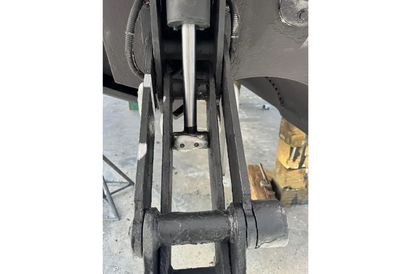 Slide: The Image of Close-up of 2013 Cabo 44 Hardtop Express hydraulic mechanism. - 100