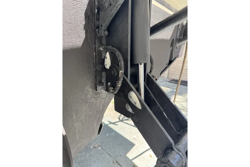 Slide: The Image of Close-up of mechanical components on a 2013 Cabo 44 Hardtop Express boat. - 104