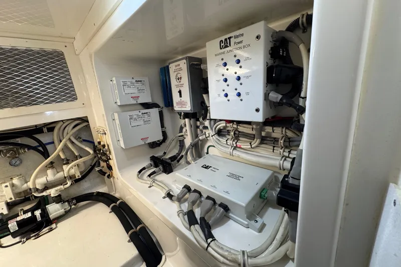 Slide: The Image of Engine room of 2013 Cabo 44 Hardtop Express with CAT Marine Power systems. - 82