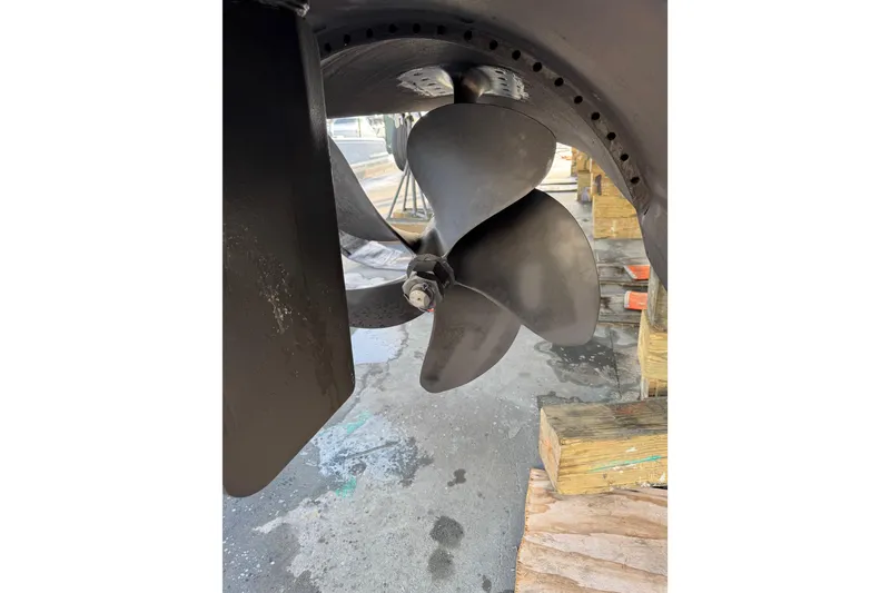 Slide: The Image of Propeller of 2013 Cabo 44 Hardtop Express boat on dry dock. - 92