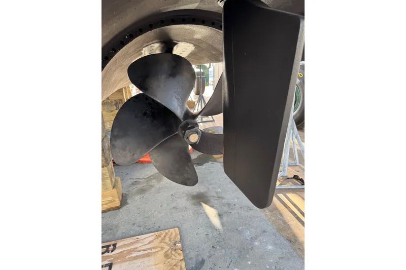 Slide: The Image of Propeller and rudder of 2013 Cabo 44 Hardtop Express boat. - 93