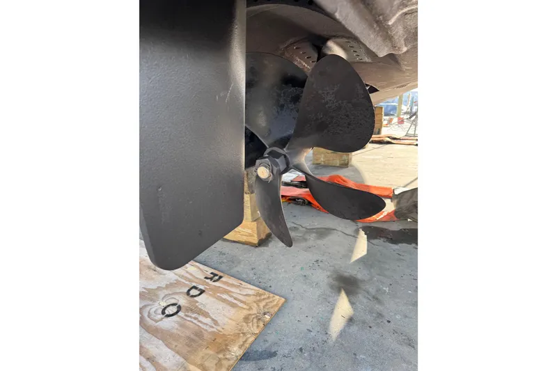 Slide: The Image of Propeller of 2013 Cabo 44 Hardtop Express boat on dry dock. - 94