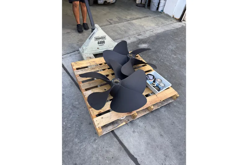 Slide: The Image of Propellers on a wooden pallet for 2013 Cabo 44 Hardtop Express boat. - 95