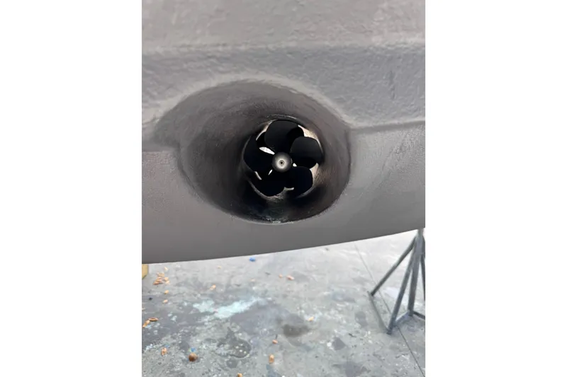Slide: The Image of Close-up of a 2013 Cabo 44 Hardtop Express boat's bow thruster. - 97