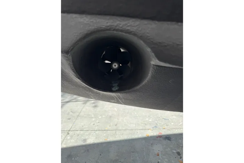 Slide: The Image of Close-up of a 2013 Cabo 44 Hardtop Express boat thruster. - 98