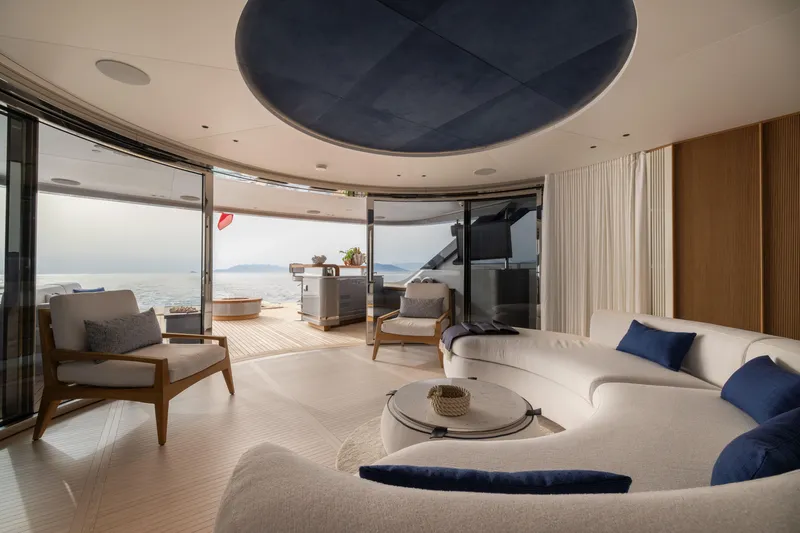 Slide: The Image of Luxurious interior of 2024 Benetti Oasis 34M yacht with elegant seating and ocean view. - 19