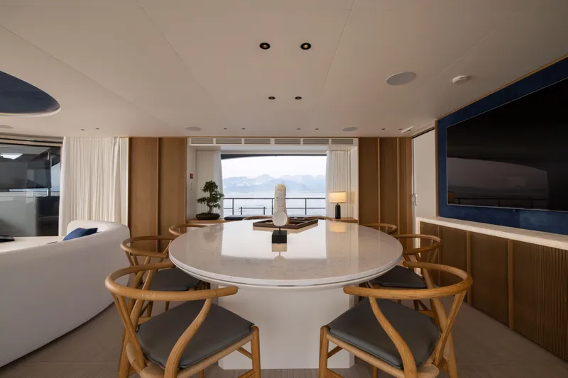 Slide: The Image of Luxurious interior of 2024 Benetti Oasis 34M yacht with elegant dining area and sea view. - 20