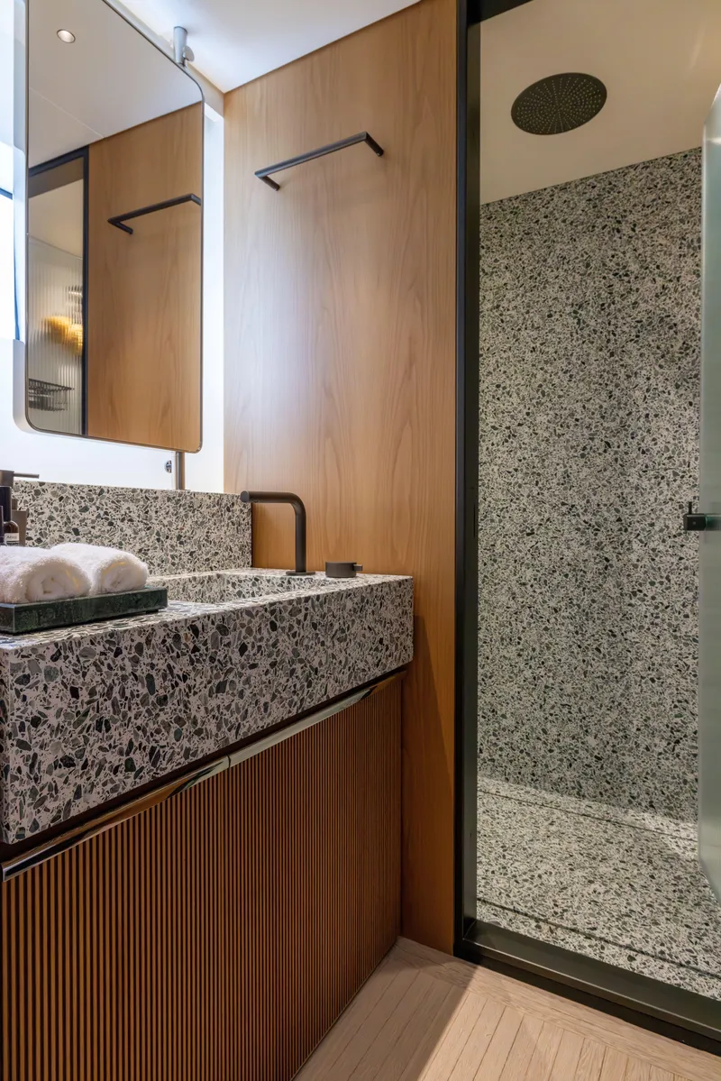 Slide: The Image of Luxurious bathroom in 2024 Benetti Oasis 34M yacht with modern design and elegant finishes. - 40