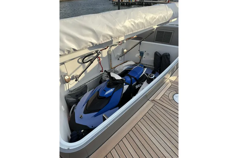 Slide: The Image of Jet ski stored on 2024 Benetti Oasis 34M yacht deck, ready for adventure. - 48