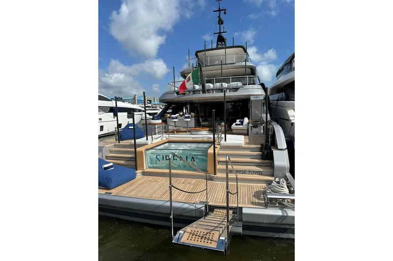 Slide: The Image of Luxury Benetti Oasis 34M yacht, 2024 model, docked with elegant deck and pool. - 49