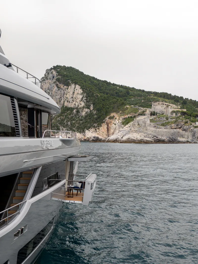 Slide: The Image of 2024 Benetti Oasis 34M yacht near rocky coastline. - 7