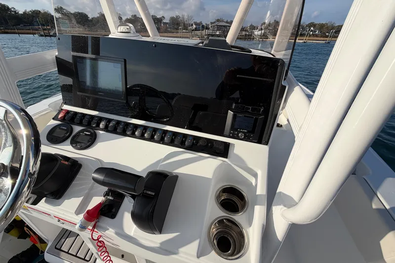 Slide: The Image of Control panel of 2025 Sea Hunt Ultra 229 boat with navigation equipment. - 37