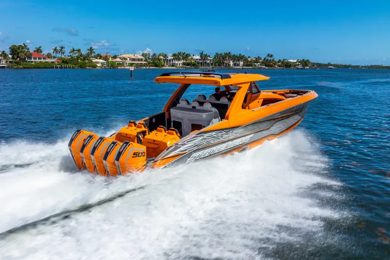 Slide: The Image of Orange 2025 Statement 44 GRTS boat speeding on water with four powerful engines. - 19