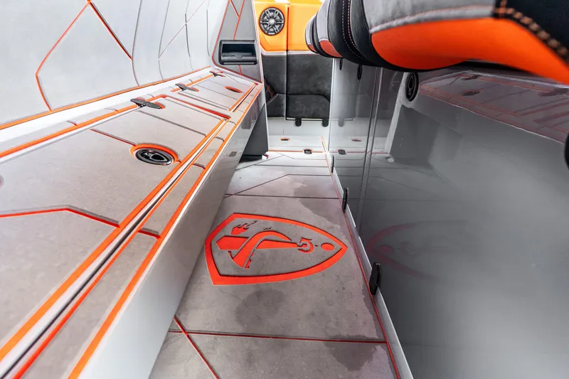 Slide: The Image of 2025 Statement 44 GRTS interior with sleek design and vibrant orange accents. - 46