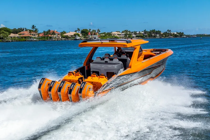 Slide: The Image of Orange 2025 Statement 44 GRTS speedboat cruising on a sunny day. - 18