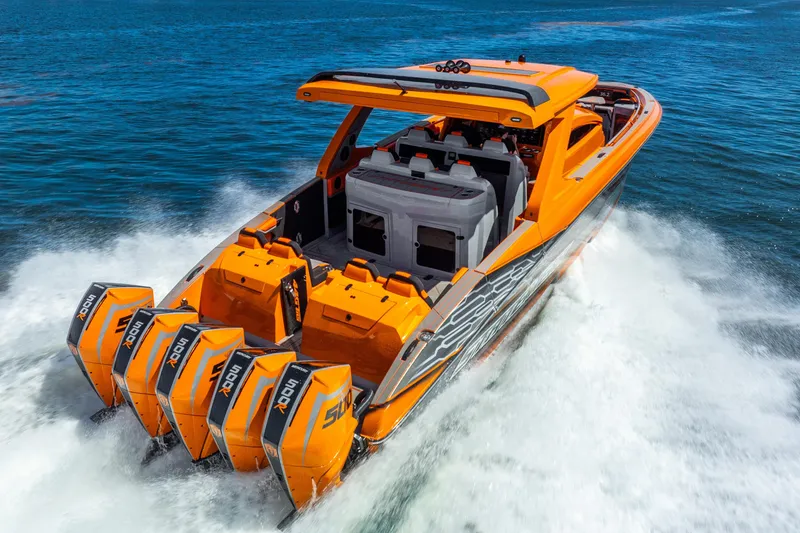Slide: The Image of Orange 2025 Statement 44 GRTS speedboat with four powerful outboard engines on water. - 20