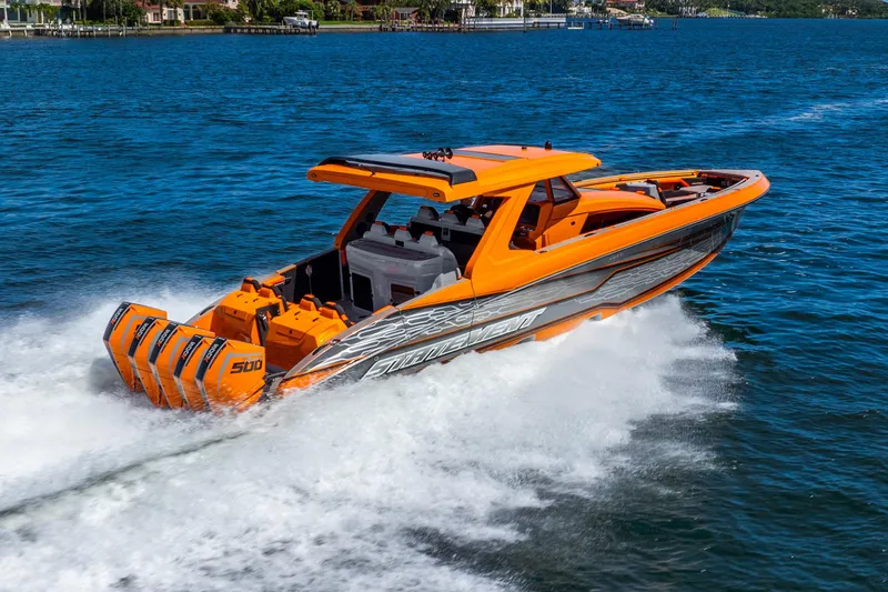 Slide: The Image of Orange 2025 Statement 44 GRTS speedboat cruising on blue water. - 22