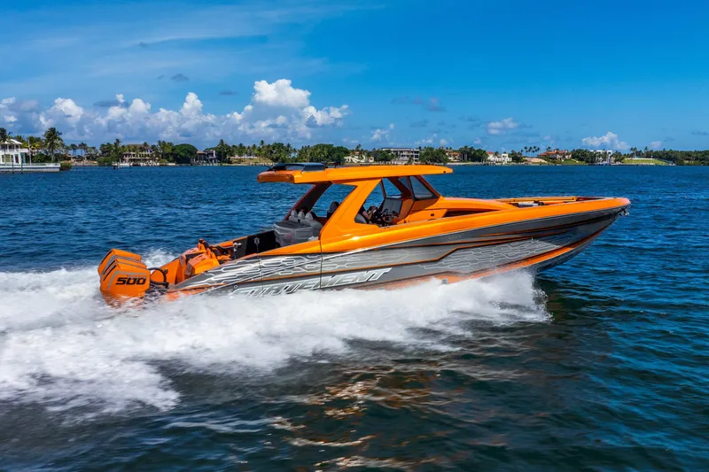 Slide: The Image of Orange 2025 Statement 44 GRTS speedboat cruising on blue water. - 23