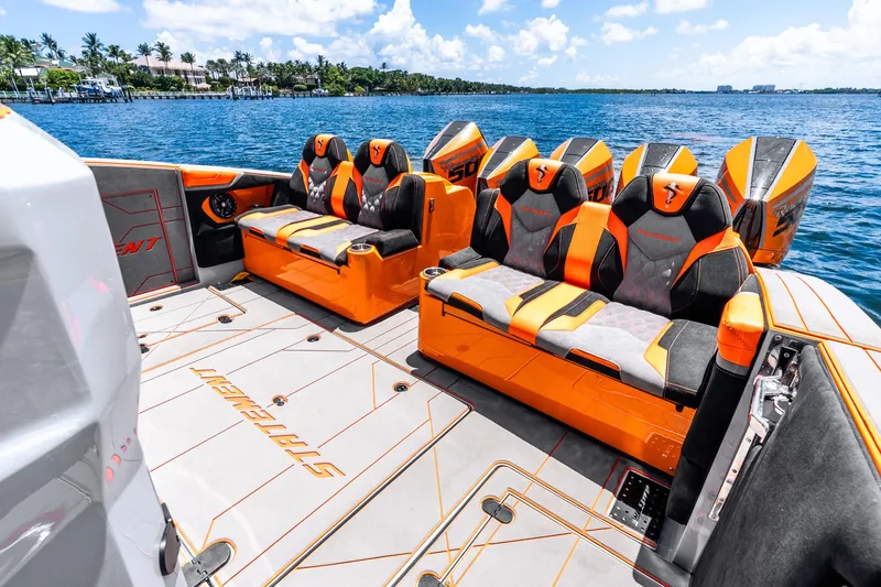 Slide: The Image of Luxurious 2025 Statement 44 GRTS boat interior with vibrant orange seating and sleek design. - 47