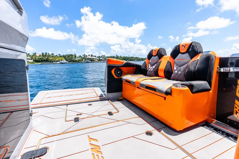 Slide: The Image of Luxury boat interior with orange seating, Statement 44 GRTS model, 2025, on a sunny day. - 59