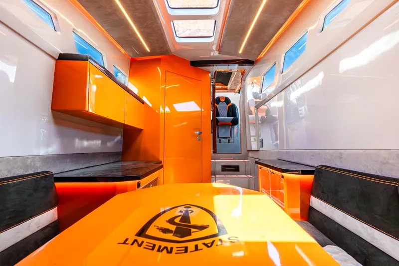 Slide: The Image of Luxurious interior of 2025 Statement 44 GRTS with vibrant orange accents and modern design. - 63