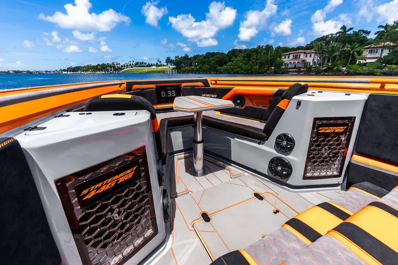 Slide: The Image of Luxurious 2025 Statement 44 GRTS boat interior with vibrant orange accents and modern design. - 67