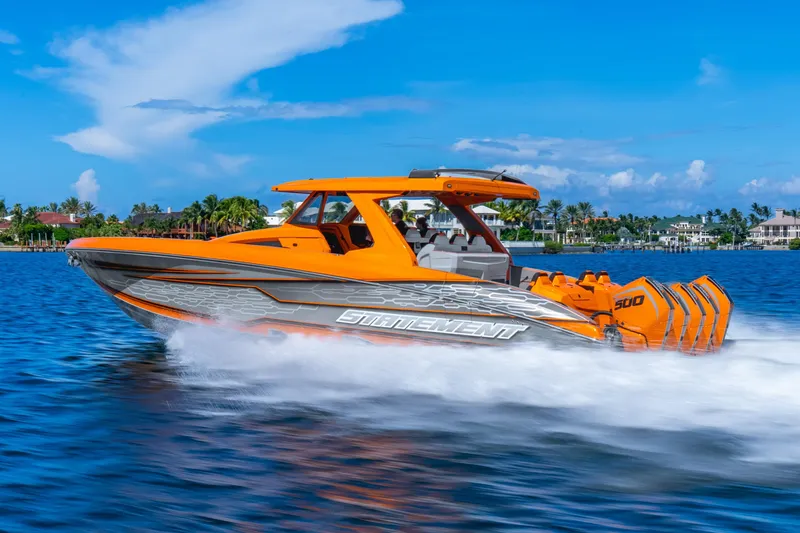 Slide: The Image of Orange 2025 Statement 44 GRTS speedboat cruising on a sunny day. - 70