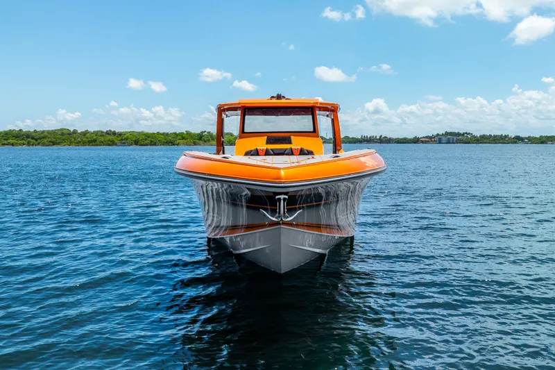 Slide: The Image of Orange 2025 Statement 44 GRTS boat on blue water under clear sky. - 8