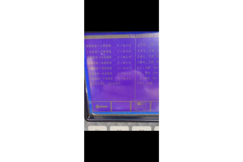 Slide: The Image of Display screen showing engine hours and RPM data for 2008 Bennington 2575 RL. - 14