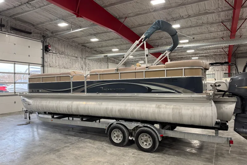 Slide: The Image of 2008 Bennington 2575 RL pontoon boat on trailer in indoor storage facility. - 3
