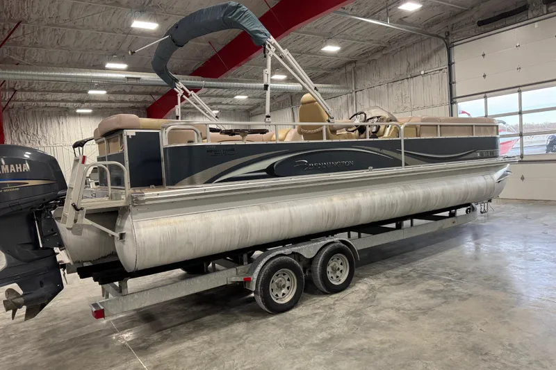 Slide: The Image of 2008 Bennington 2575 RL pontoon boat on trailer in indoor storage facility. - 4