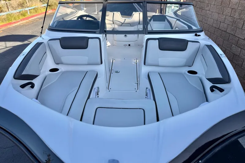 Slide: The Image of 2019 Yamaha Boats SX190 interior with spacious seating and modern design. - 10