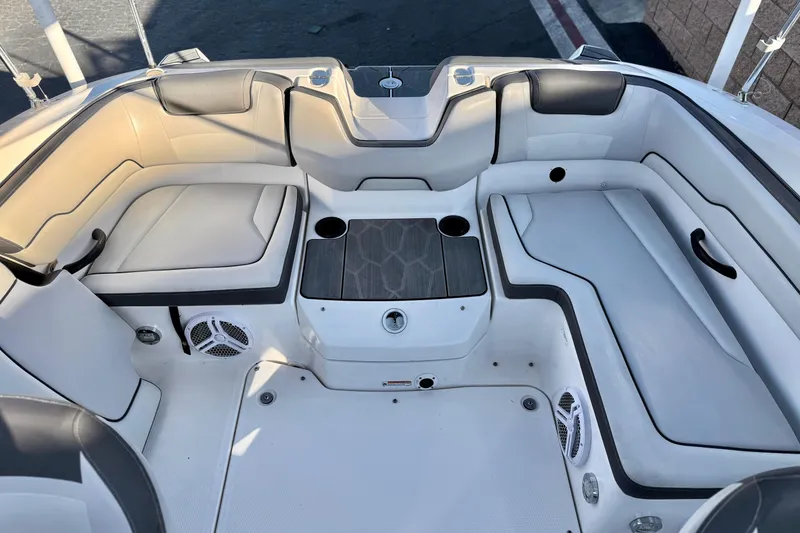 Slide: The Image of 2019 Yamaha Boats SX190 interior with spacious seating and modern design. - 15