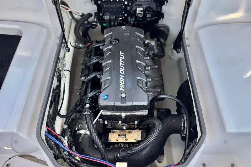 Slide: The Image of 2019 Yamaha Boats SX190 engine compartment showcasing high output engine components. - 17